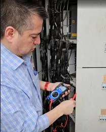 Aviran Vargas electrical testing with a multimeter